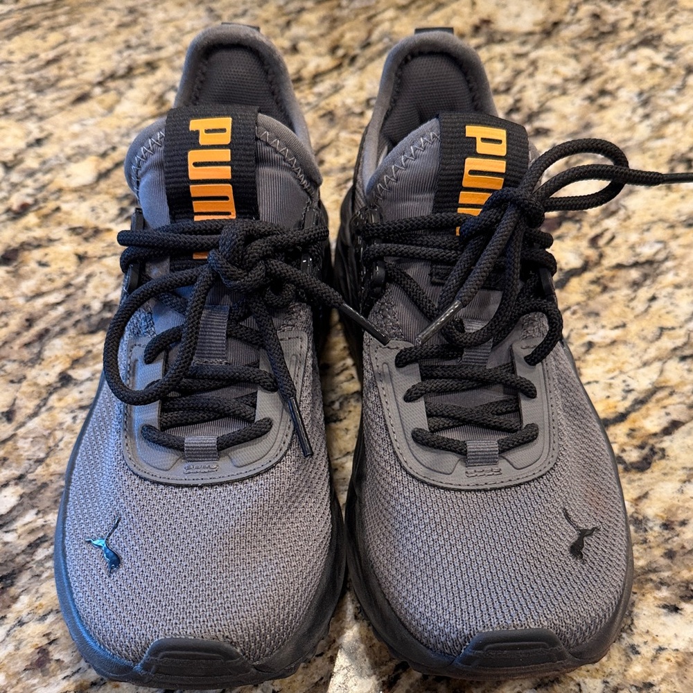 Puma Charcoal Sneakers with Vibrant Orange Details